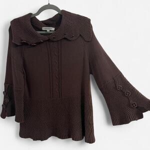 Cozy vintage knit sweater top from “Jaguar” with bell sleeves + button details